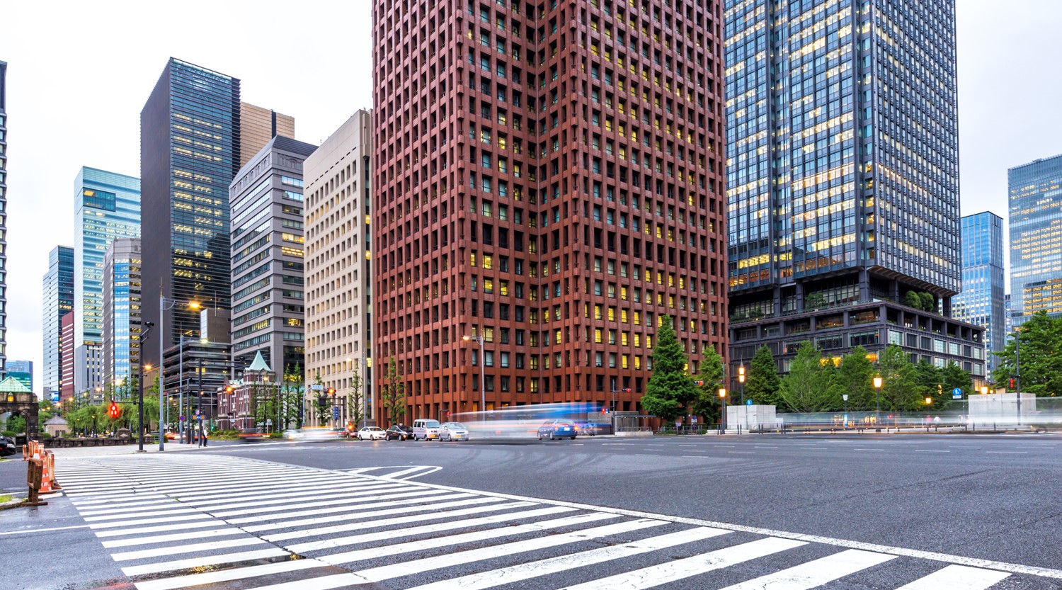 Empty crosswalk on city street during daytime